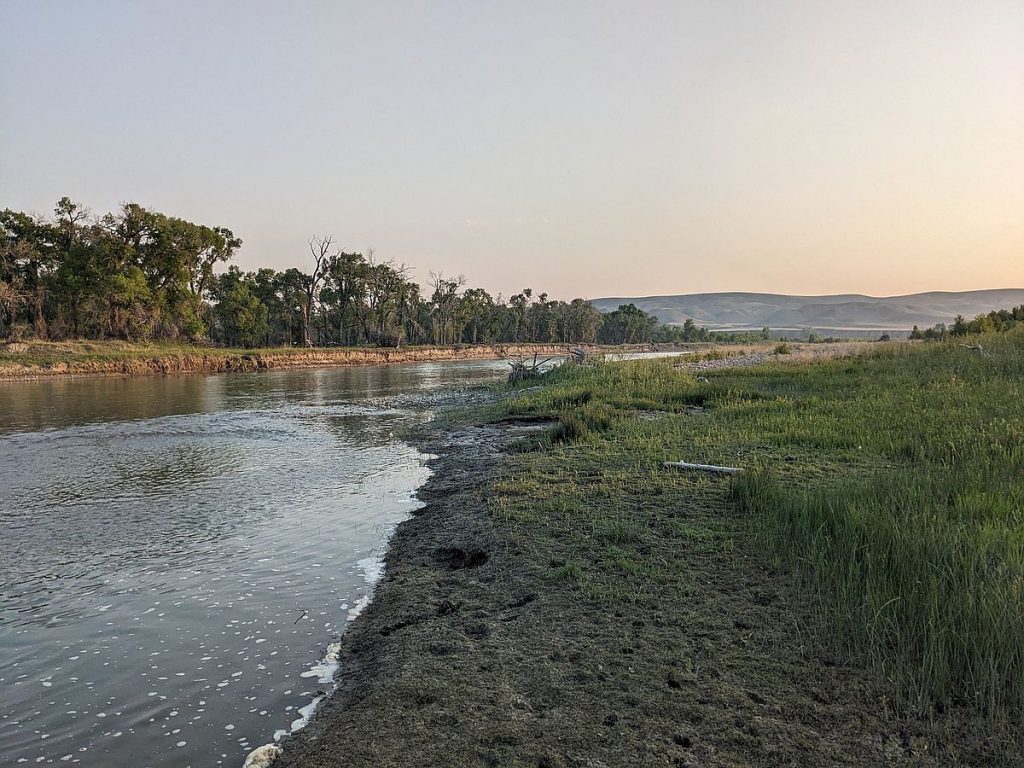 At the edge of the Marias River.