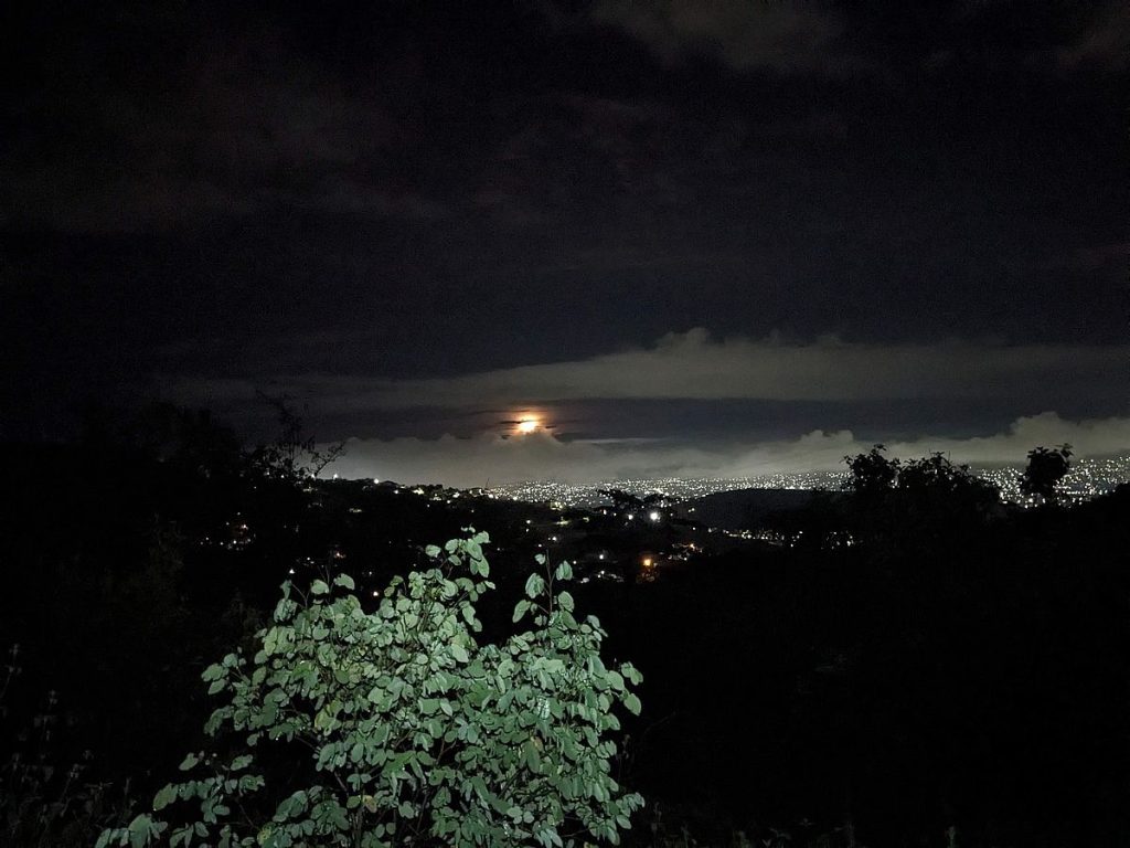 The moon slides into the clouds above Oaxaca de Juárez.